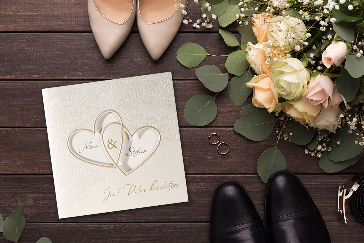 Elegante Hochzeitseinladungen mit zwei Herzen - Schmuckbild oben
