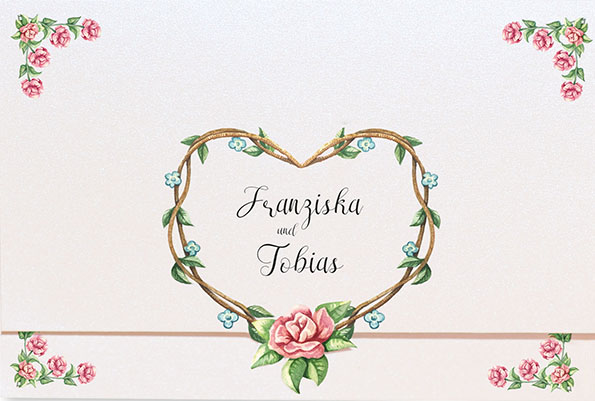 Mit Blumenranken und Rosenblüten verzierte Hochzeitseinladungen.